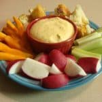 Hot Artichoke Dip Recipe. Find this & more deliciousness @ https://www.slowcookerkitchen.com