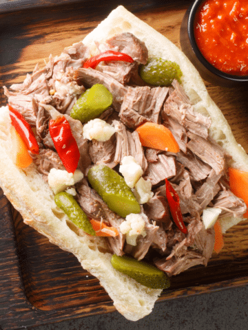 beef sandwich topped with Chicago-style giardiniera
