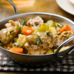 Slow cooker chicken fricassee with chicken, potatoes, carrots and celery