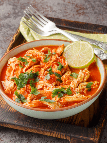 Slow cooker salsa chicken with tender shredded chicken and fresh lime